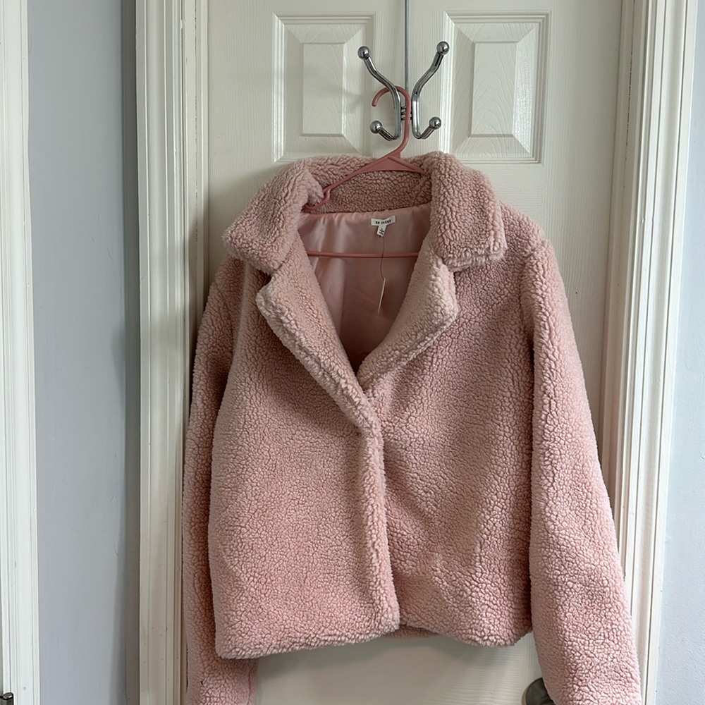 En crème light pink jacket
